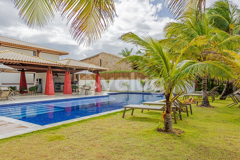 Lindo Apartamento pé na areia com 2 suítes em Itacimirim