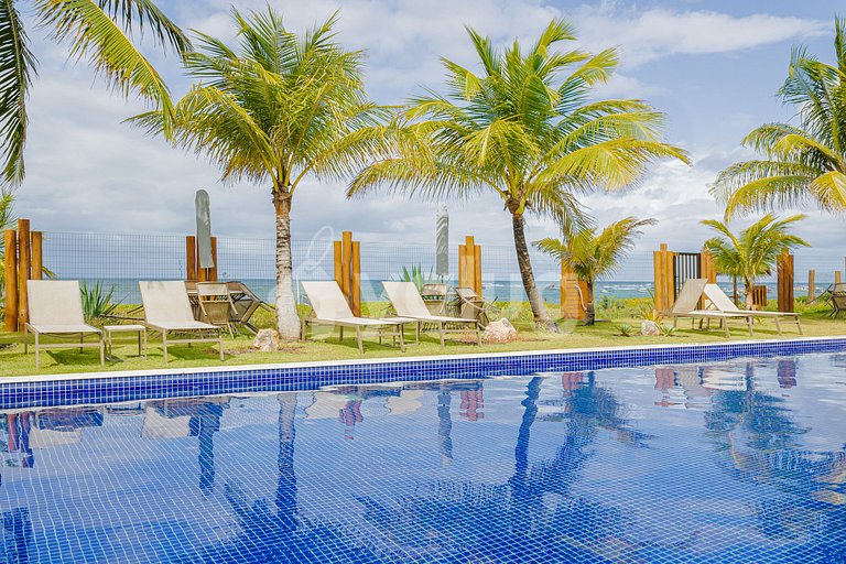 Lindo Apartamento pé na areia com 2 suítes em Itacimirim