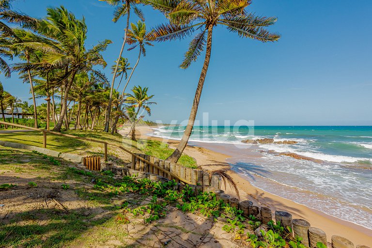 Luxury mansion with 5 suites, beachfront with private pool.