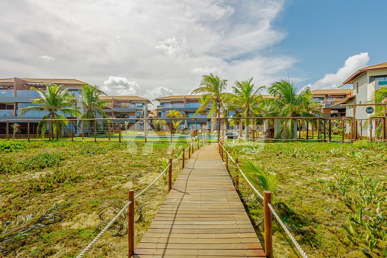 Excelente apartamento pé na areia com 2 suítes - Itacimirim